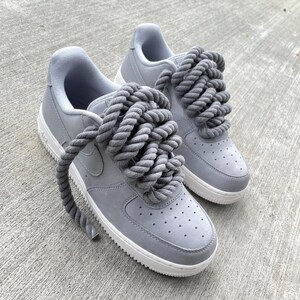 grey and white nike af1