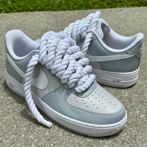 gray and white air force ones patent leather with rope laces