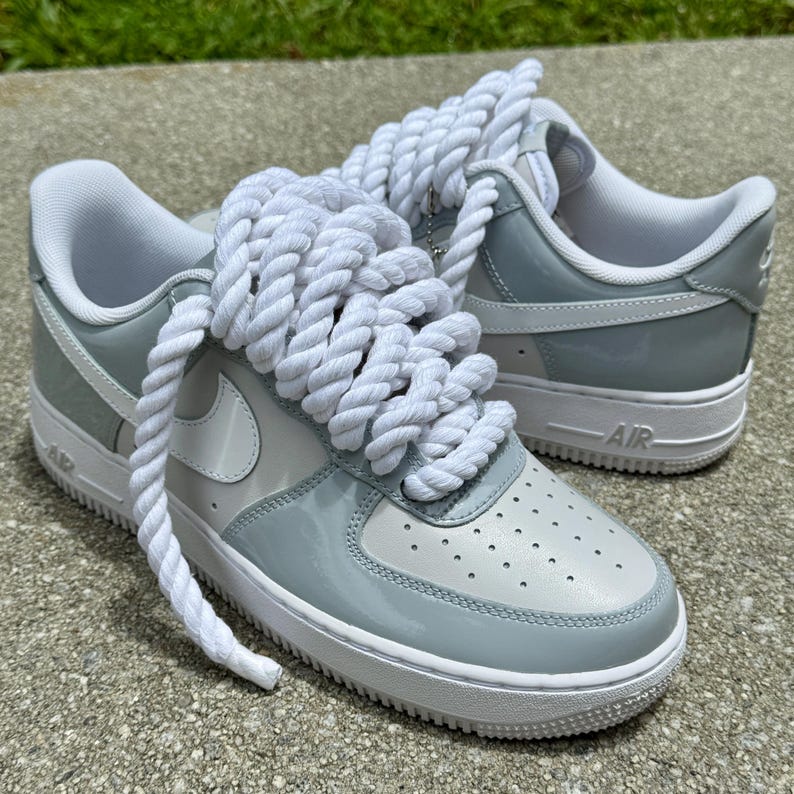 gray and white air force ones patent leather with rope laces