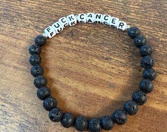 Bracelet en perles de pierre de lave noire F*ck Cancer