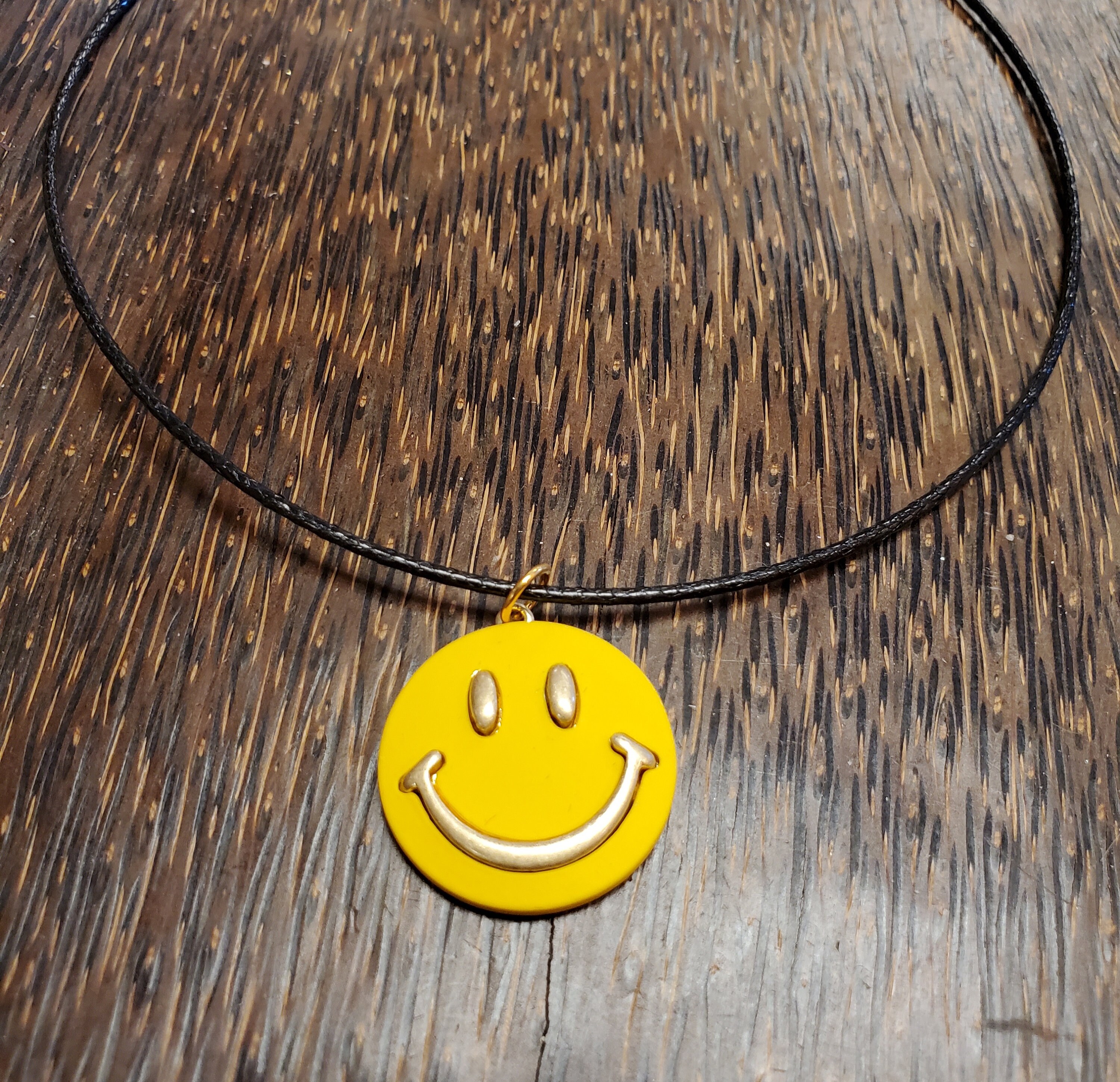 Yellow Smiley Face Necklace on Black 