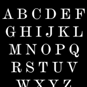 May include: A black background displays the alphabet in white serif font. The letters are arranged in rows, from A to Z. The text "#3 Bluegrass Barrel" is at the top. This image is suitable for educational materials or design projects.