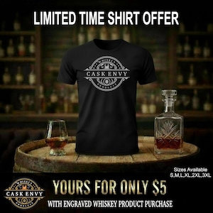 May include: Black t-shirt with a white circular logo that reads "Cask Envy Products" and "Whiskey". The image includes a whiskey glass, a decanter, and the text "Limited Time Shirt Offer". Sizes available: S, M, L, XL, 2XL, 3XL.