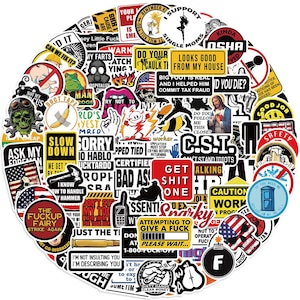 May include: A circular collection of assorted stickers with various designs and text. The stickers feature a range of colors, including red, black, white, and yellow. Some stickers have humorous phrases, while others display illustrations of skulls, flags, and other graphics.