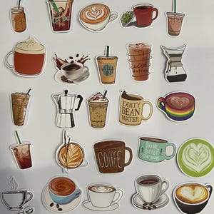May include: A collection of 24 coffee-themed stickers featuring various coffee drinks, coffee makers, and coffee-related phrases. The stickers are colorful and feature a variety of styles, including cartoon, realistic, and abstract.