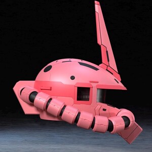 Op de afbeelding: Een roze robotkop met een hoge vin en een cilindrische arm. De kop heeft een afgeronde bovenkant met zwarte details en een rechthoekig venster. Het ontwerp suggereert een futuristisch of sciencefiction thema.