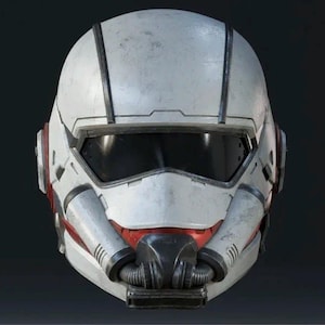 May include: A futuristic white helmet with black accents and a dark visor. The helmet has red details on the sides and a complex design around the mouth area. The overall aesthetic suggests a sci-fi or military theme.
