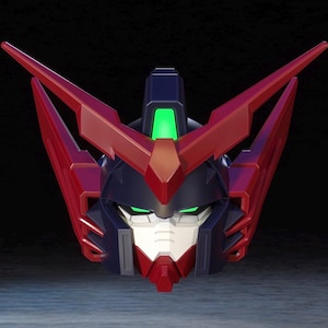 May include: A detailed, close-up of a robot head with a striking design. The head features a combination of red, navy blue, and white colors, with glowing green accents. The design is angular and futuristic, with sharp lines and a bold aesthetic.