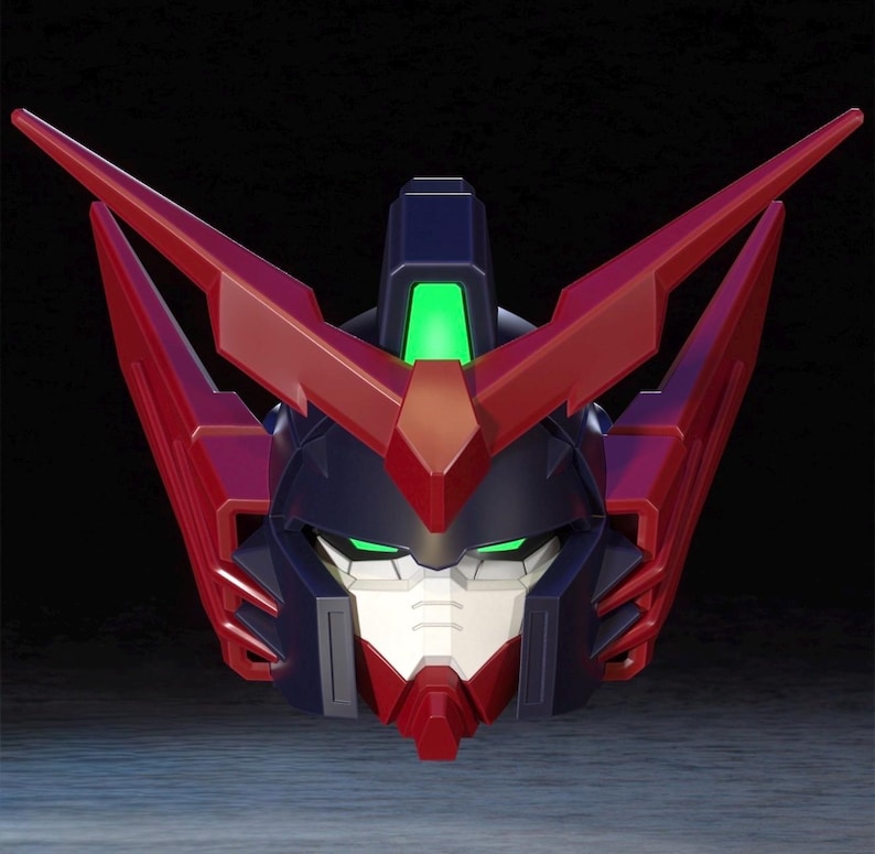 May include: A close-up of a robot head, featuring a striking colour scheme. The head is predominantly red, navy blue, and white, with glowing green details. The design is angular and futuristic, with sharp lines and a bold aesthetic.