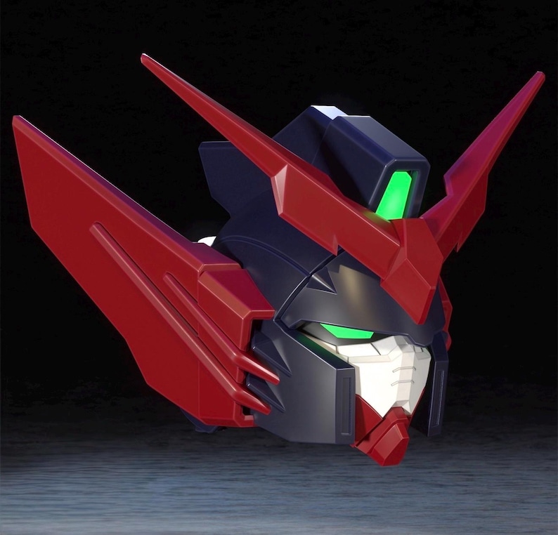 Puede incluir: Primer plano de una cabeza de robot en rojo y negro con dise&ntilde;o detallado. Los ojos brillan en verde y hay una luz verde en la parte superior. Es un kit de modelo.