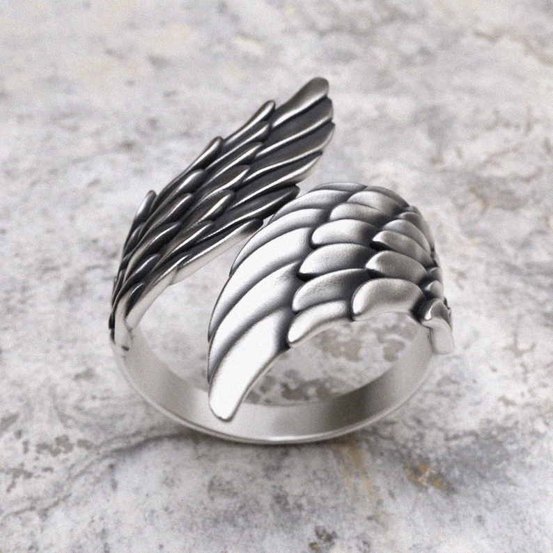 925 sterling silver wing ring featuring detailed feather design with oxidized finish from front view
