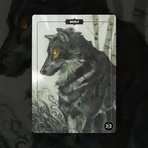 May include: A rectangular trading card featuring a painted illustration of a dark grey wolf with glowing amber eyes. The word WOLF is printed in a black banner at the top, and the number 2/2 is displayed in a black circle at the bottom right.