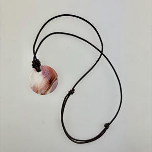 Handmade leather necklace with a pink glass pendant