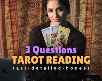 May include: A woman holds three tarot cards in her hands. The cards are the Queen of Wands, the Five of Wands, and the Two of Swords. The text on the image reads "3 Questions TAROT READING fast - detailed - honest".