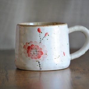 Hand-Painted Floral Ceramic Mug – Speckled Cream Coffee Cup, Rustic Pottery, Watercolor Blossom Art