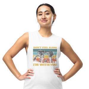 Stylish Muscle Shirt for Women - Comfortable Sleeveless Tank Top for Workouts & Casual Wear.