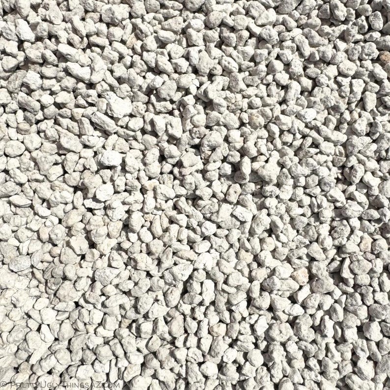 White pumice rock in coarse grain chunks.