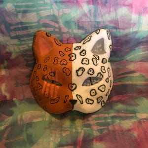 snow leopard vs leopard therian mask