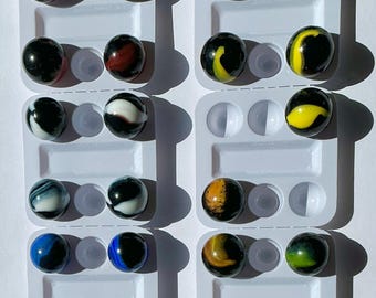 bolinhas de gude pretas