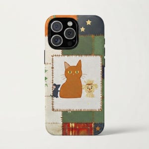 May include: A phone case featuring a patchwork design with a central white square containing an orange cat, a small black mouse, and a straw scarecrow figure. The background includes green, orange, and red plaid patches with yellow star accents.