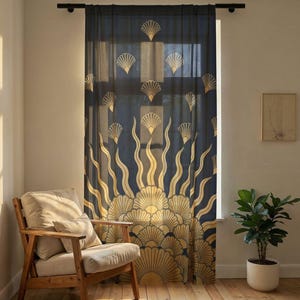 May include: A navy blue curtain with a gold art deco design of sunbursts and fan shapes. The curtain hangs in front of a window, with a wooden chair and a potted plant in the room.