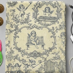 May include: A cream-colored blanket with a repeating pattern of cherubs in ornate frames. The cherubs are depicted in various activities, including using a tablet, taking selfies, and DJing. The blanket has a vintage, antique aesthetic.