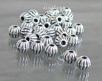 Antiqued Silver Corrugated Round Beads 25 : 5.6mm sgr