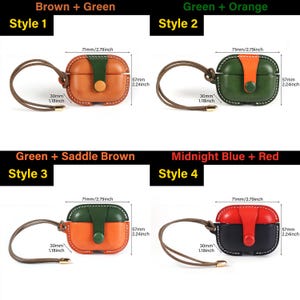 May include: Four leather earphone cases with wrist straps, each featuring a snap closure and colour-blocked design. Dimensions are 71mm wide by 57mm high, with a 30mm strap width. Styles include brown/green, green/orange, green/saddle brown, and midnight blue/red.