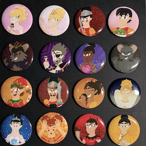 May include: Set of 16 round buttons featuring characters from the Nutcracker ballet. The buttons are colorful and feature various characters, including the Nutcracker, Clara, the Mouse King, and the Sugar Plum Fairy.