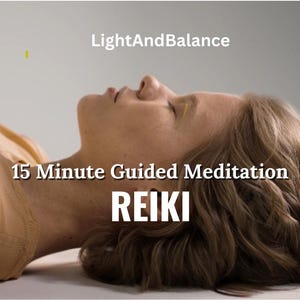 May include: A woman lies on her back with her eyes closed, meditating. The text "15 Minute Guided Meditation REIKI" is displayed below her.