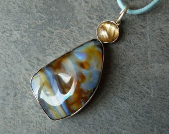 Silver pendant with 1 rutil quartz and a boulder opal: IMPORTANT,French vat is included, 20% off for US,UK and canadian buyers