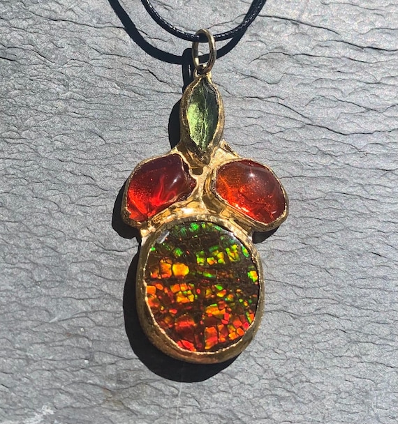 Pendant,18 and 24 ct gold,silver,1 ammolite,2 fire opals,1 peridot; IMPORTANT, French vat is included,20% off for US,UK and canadian buyers