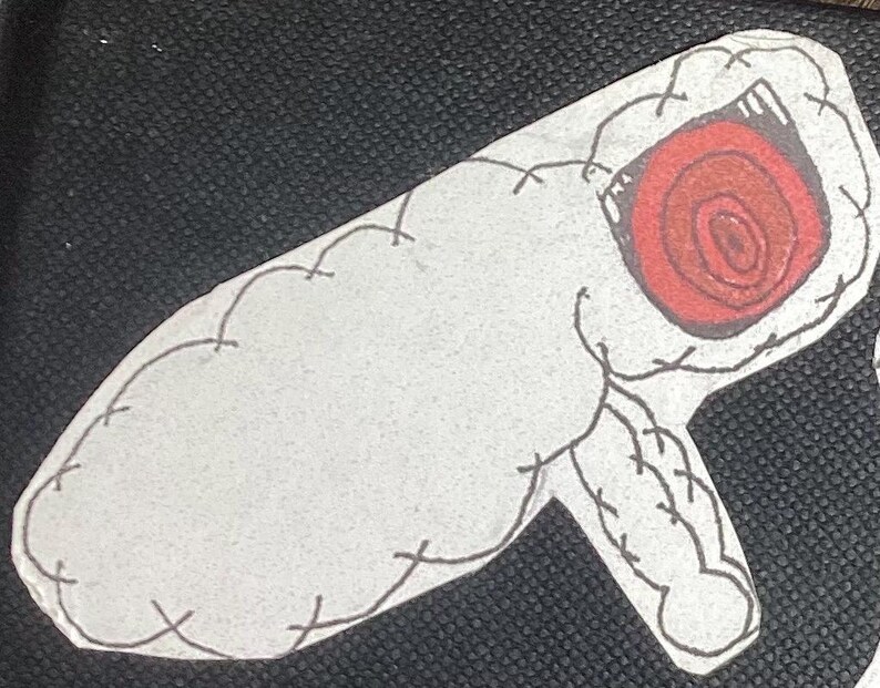 K&ouml;nnte beinhalten: Ein wei&szlig;es, gen&auml;htes, cartoonartiges Objekt mit einem roten, kreisf&ouml;rmigen, augenartigen Design. Das Objekt ist geformt wie ein langes, d&uuml;nnes Rohr mit einem abgerundeten Ende.