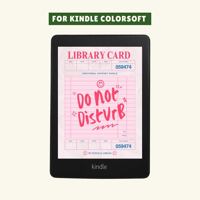 May include: A black Kindle e-reader displaying a pink library card design with the text "Do Not Disturb." The card includes the text "Emotional Support Kindle" and the number 059474. The top of the image reads "For Kindle ColorSoft."