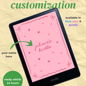 May include: A black Kindle e-reader displaying a pink lockscreen with hearts and the text "juliana's kindle." The image promotes Kindle and Kobo lockscreen customization, available in blue, pink, and purple. Text includes "your name here" and "ready within 24 hours."