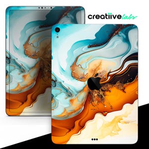 May include: Abstract iPad skin with a swirling pattern of blue, orange, and white. The design features a marble-like effect with a black Apple logo in the center.