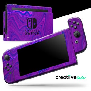 May include: A Nintendo Switch console and controllers with a vibrant purple, blue, and pink swirling pattern. The console features the Nintendo Switch logo. The controllers are attached to the screen, and the design covers the entire device.