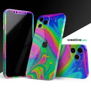 May include: Three iPhone cases with a colorful abstract swirl pattern. The cases are in shades of pink, blue, green, and yellow. The cases are designed to fit the iPhone 13 Pro.