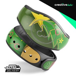 May include: A green, yellow and red patterned Disney MagicBand featuring a Mickey Mouse silhouette and a star design. The band is made of durable plastic and is designed to be worn on the wrist.
