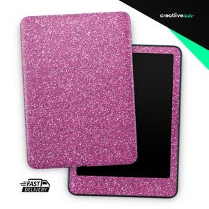 May include: A pink glitter tablet case and tablet with a black screen. The case is open, revealing the tablet. The case and tablet have a matching pink glitter design. The words "Fast Delivery" are in the lower left corner.