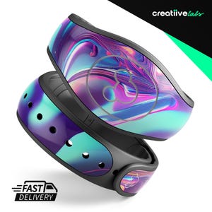May include: A purple, blue, and green swirl patterned MagicBand with a silver Mickey Mouse icon. The band is made of durable plastic and is designed to be worn on the wrist.
