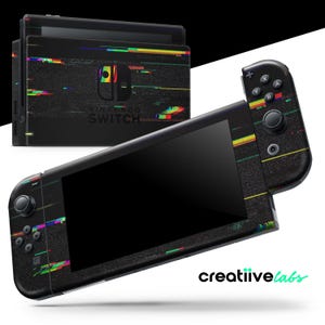 May include: Black Nintendo Switch console and controllers with a glitch effect design. The console and controllers have a black background with colorful horizontal lines and the Nintendo Switch logo. The text "Nintendo Switch" is visible on the console.