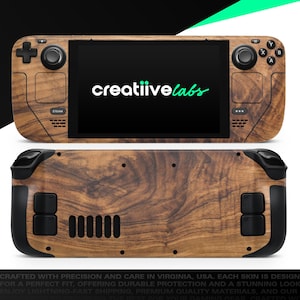May include: A wooden-effect skin for a handheld gaming console. The skin covers the front and back of the device, with the text "creatiivelabs" on the screen. The device has buttons, joysticks, and a screen.