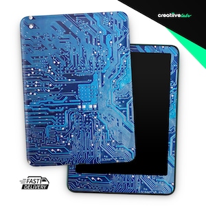 May include: Two blue tablet cases with a circuit board design. The cases are a dark blue with light blue and white lines. The tablet screen is black. The words "creatiivelabs" are in white text in the upper right corner. The words "FAST DELIVERY" are in black text in the lower left corner.