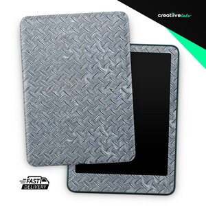 May include: A tablet with a silver, diamond-plate textured cover. The cover is partially open, revealing the black screen of the tablet. The words "Fast Delivery" are printed on the bottom left.