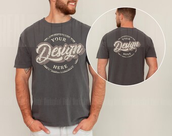 May include: A dark grey t-shirt with a vintage-style circle graphic that says "Your Design Here" on the front and back.