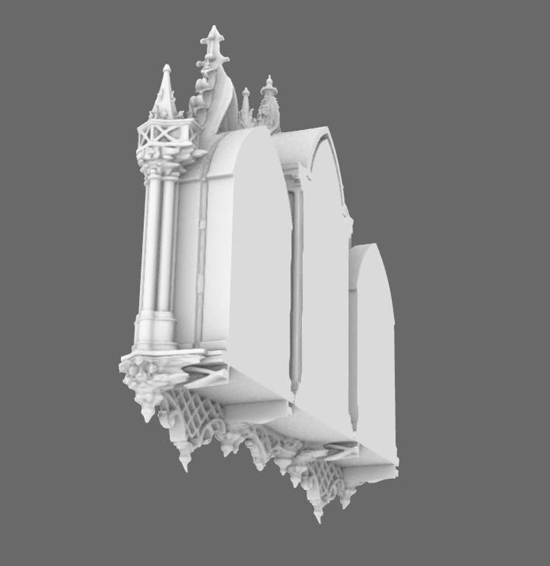 May include: A white, architectural model of a gothic building with arched windows, ornate columns, and decorative spires. The model has intricate details and a textured surface, suggesting a focus on historical or fantasy themes.