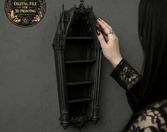 May include: A black, gothic-style coffin-shaped shelf with four shelves. The shelf is mounted on a dark gray wall. A circular graphic with the text "DIGITAL FILE FOR 3D PRINTING" is in the upper left corner.