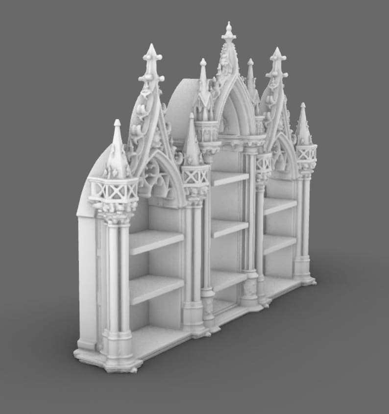 May include: A white, gothic-style bookshelf with multiple shelves. The bookshelf features ornate architectural details, including pointed arches, spires, and decorative columns. The design is reminiscent of a cathedral or church, with a focus on vertical lines and intricate carvings.