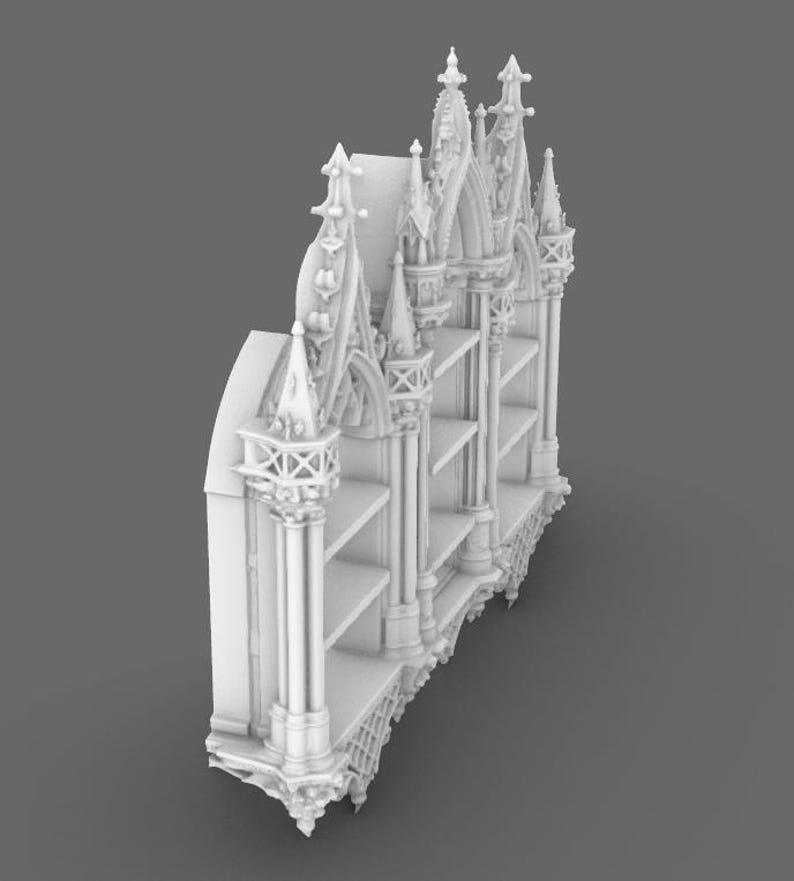 May include: A white, ornate bookshelf with a gothic architectural design. The bookshelf features multiple shelves and decorative spires, arches, and columns. The overall design is symmetrical and detailed, with a focus on intricate carvings and pointed elements.